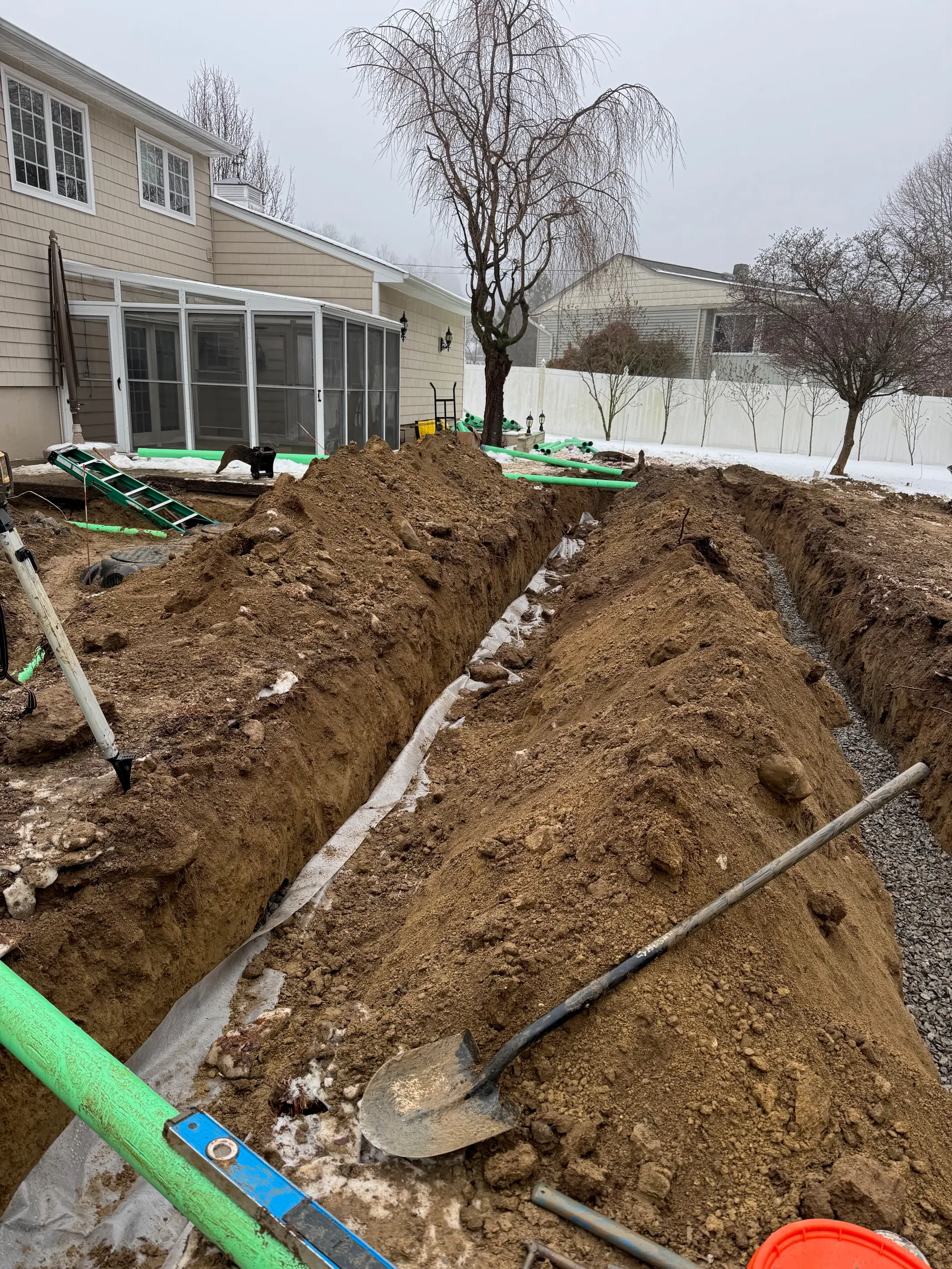 Site work in progress with excavator and operator