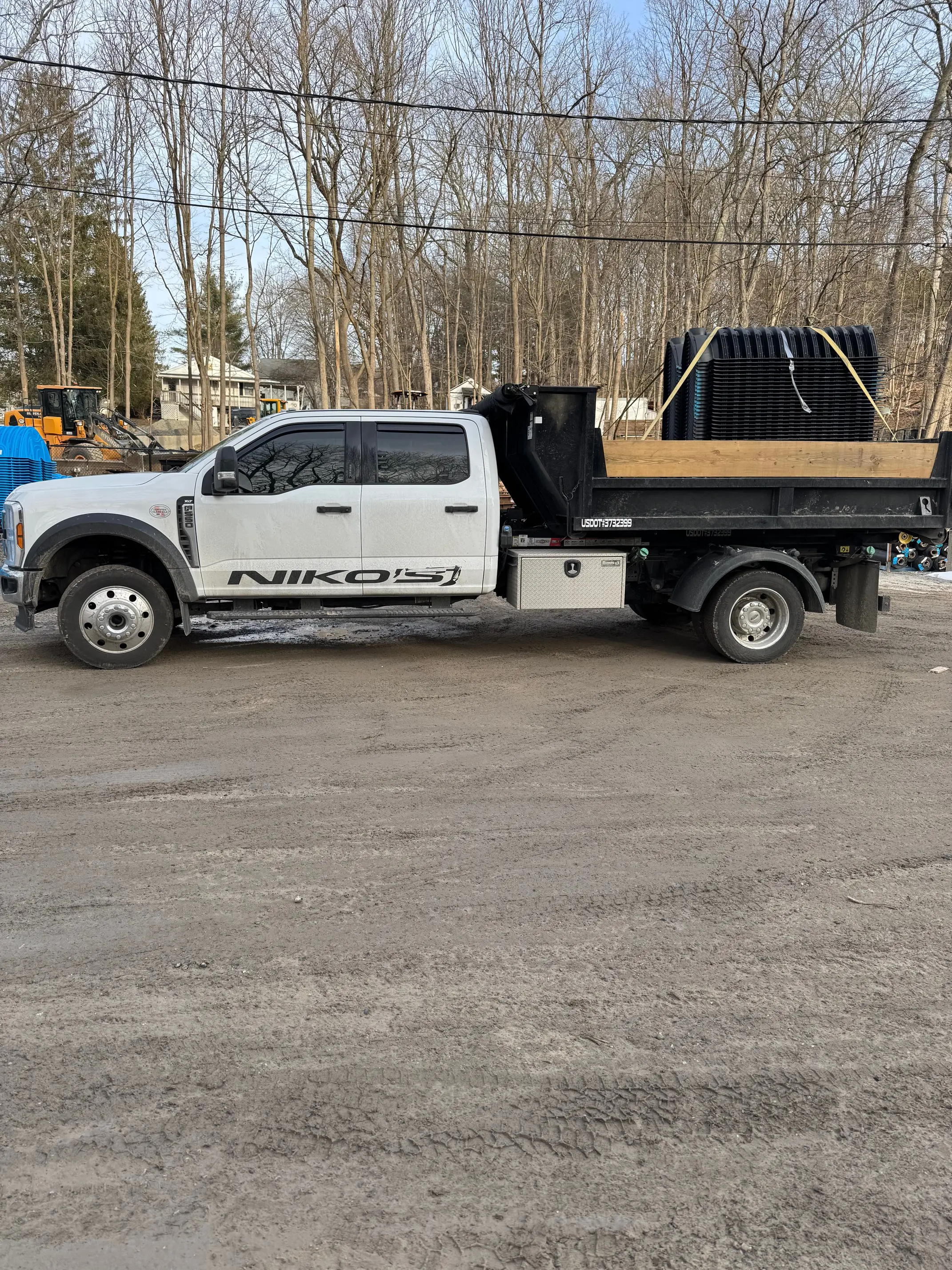 Roll-off dumpster delivered to a residential job