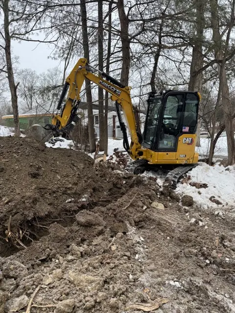Dump truck delivering bulk material to a job site