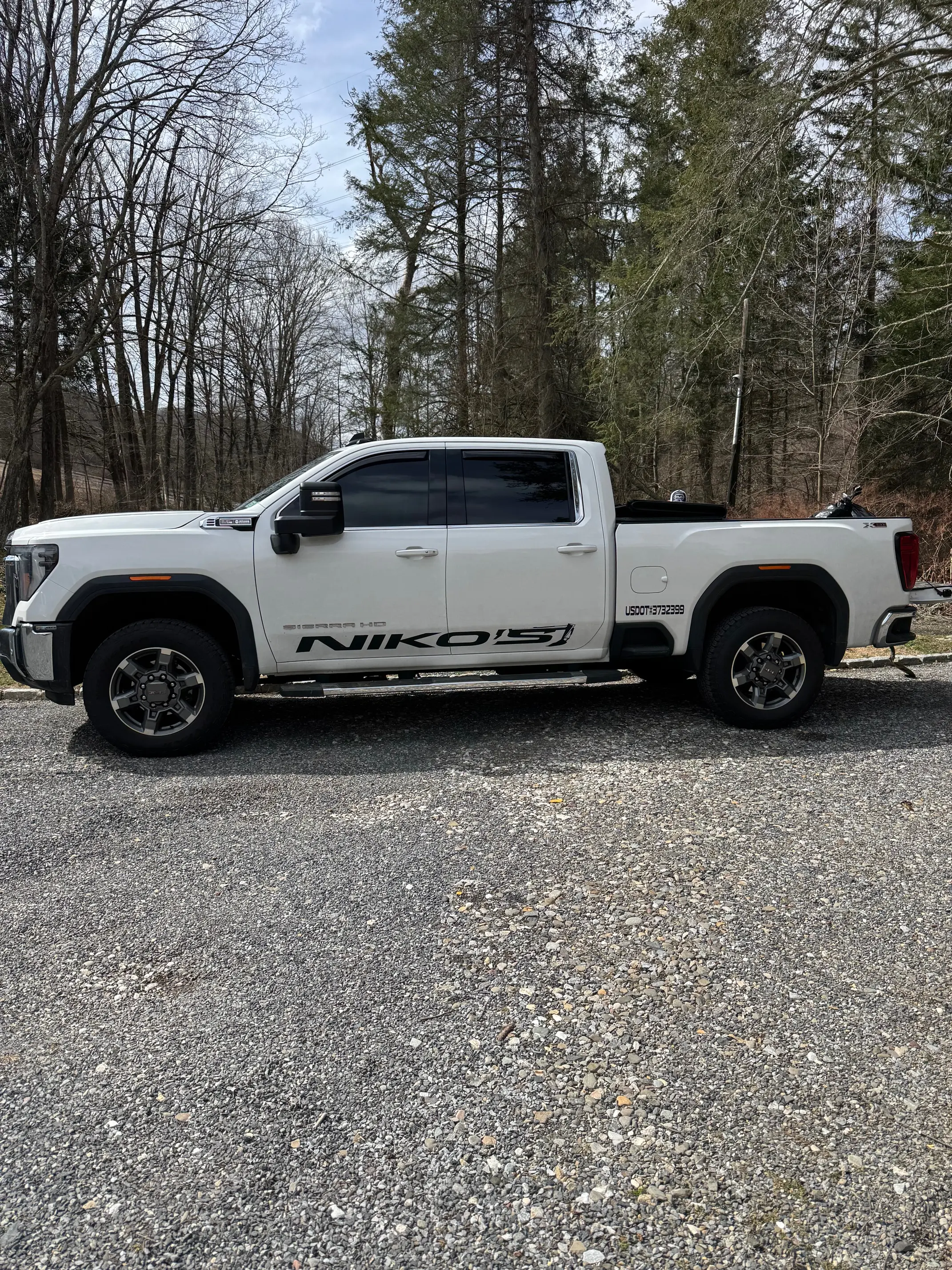 Crushed stone delivery on a residential driveway
