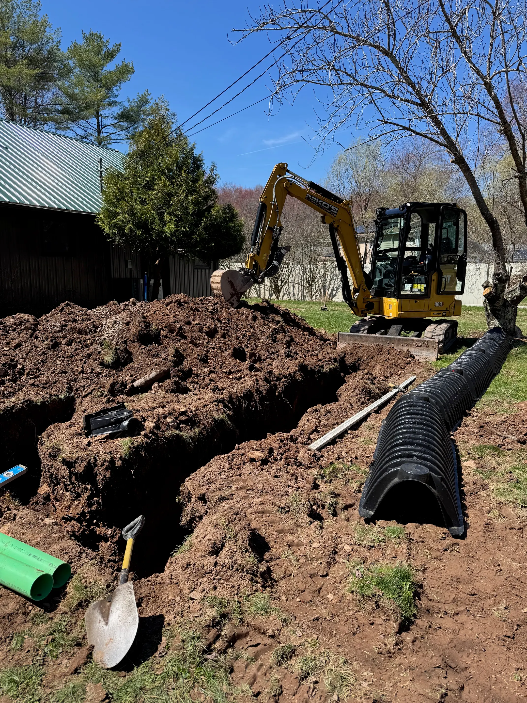 Excavation work in progress on a residential job site
