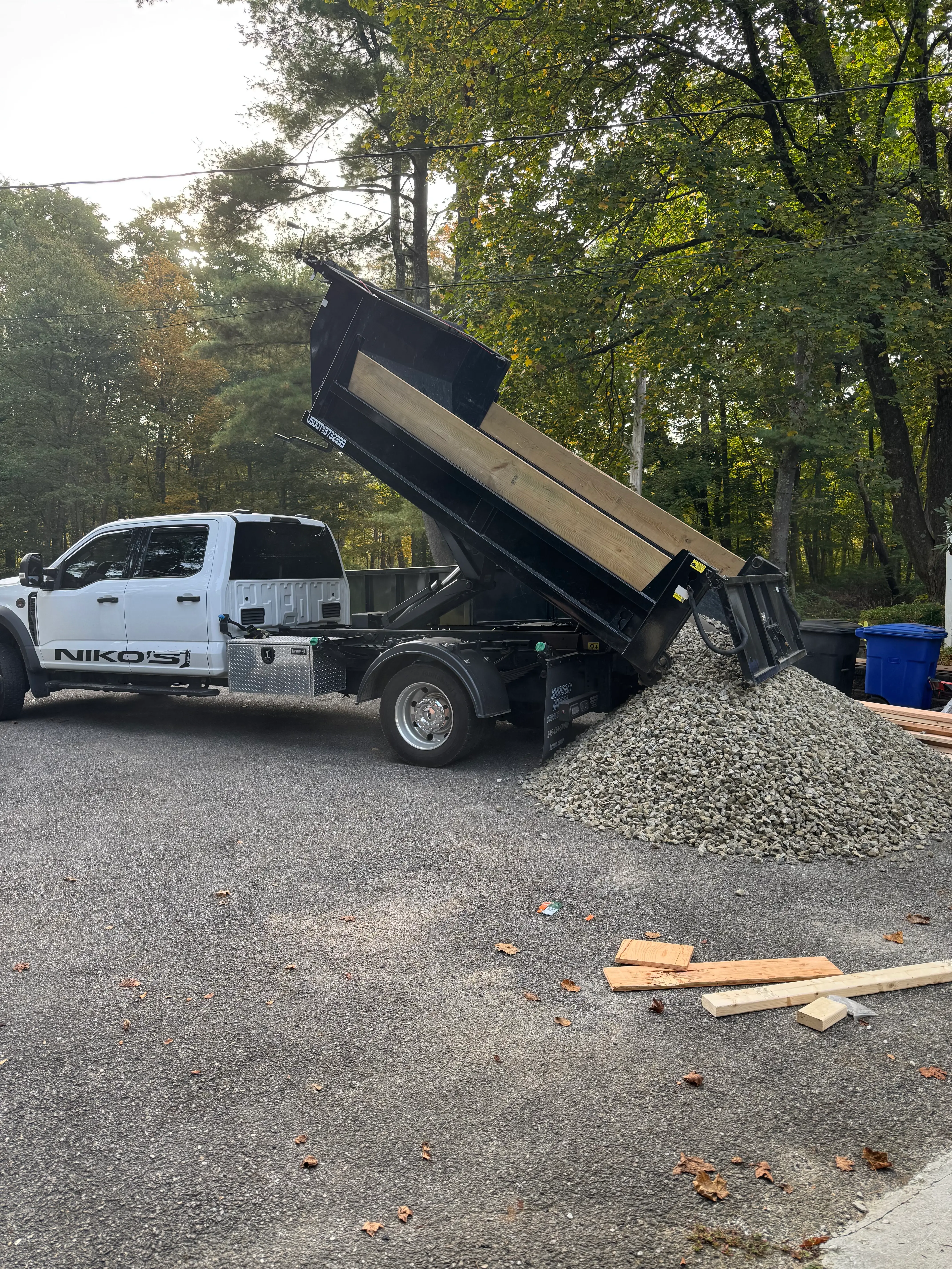 Dump truck unloading topsoil