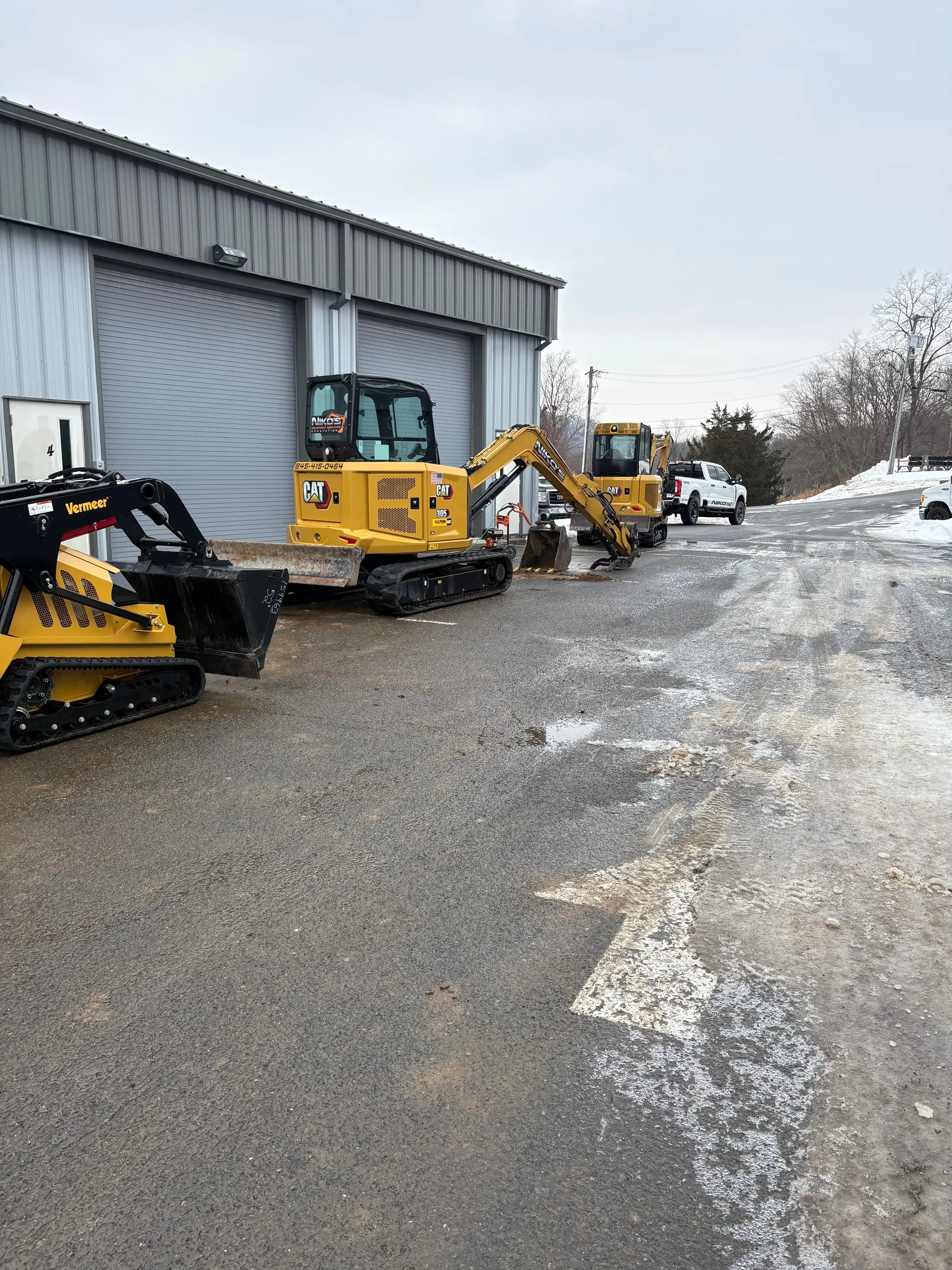 Excavator working on a Hudson Valley site-work project